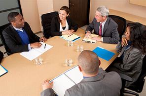 Business people negotiating at a table