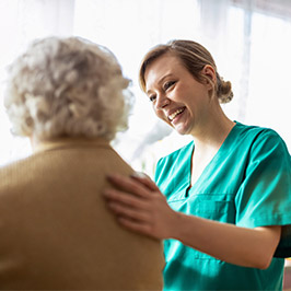 nurse talking with her patient