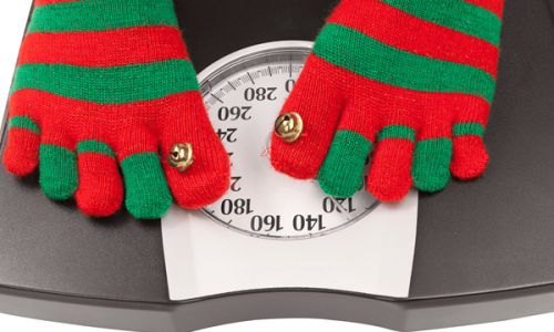 Holiday socks on a weight scale.