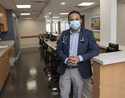 Vinod Nookala, MD, FACP examines a patient at the Medical Clinic at Community Medical Center in Toms River, NJ