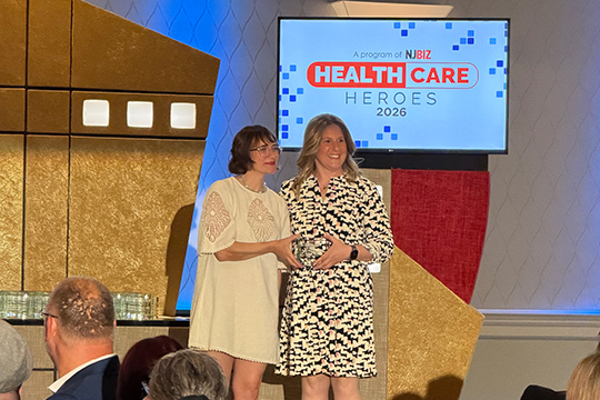 Audrey Kleet accepting award