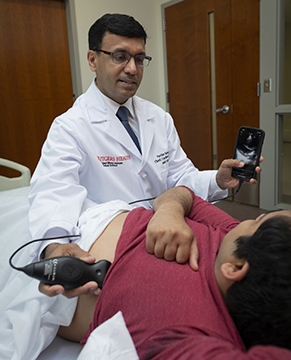 Partho Sengupta with portable ultrasound