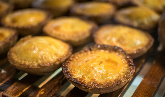 mini chicken pot pies cooling on a rack