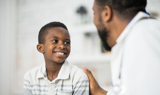 child in doctor's office getting a checkup