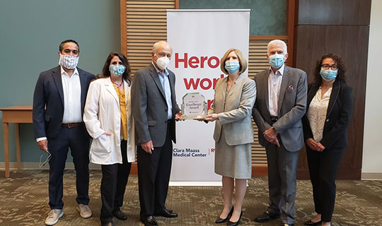 Robert
		 Gaccione, Esq., Chairman, Board of Trustees; Mary Ellen Clyne, PhD, President
		 and Chief Executive Officer accepting Healthgrades Patient Safety Award