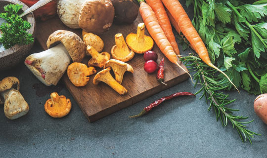 healthy foods for fall including mushrooms, berries, and carrots