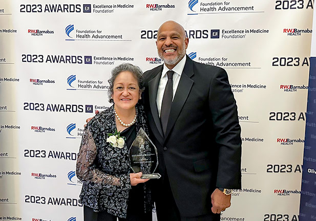 Dr. Margarita Camacho with Newark Beth Israel Medical Center and Children's Hospital of New Jersey President and CEO Darrell K. Terry, Sr.