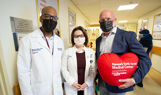 James McFarland with his medical team including cardiac surgeon Dr. Persida Drotar