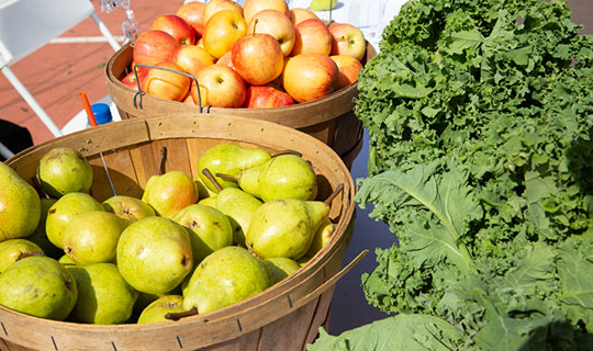 NBI Farmers Market - buckets of apples, pears, and kale