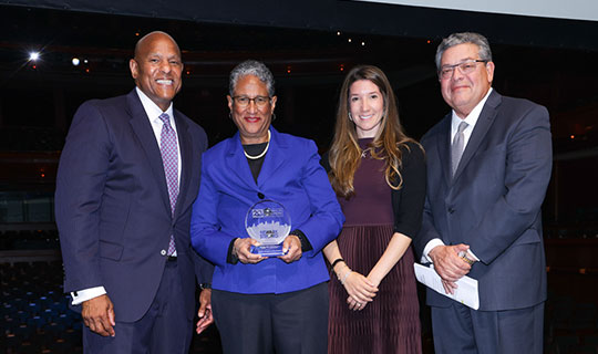 Denise Rodgers, MD, FAAFP receiving the Marc E. Berson Community Award
