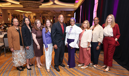 Darrell K. Terry, Sr. MHA, MPH, FACHE, FHELA, President and Chief Executive Officer, Newark Beth Israel Medical Center and Children’s Hospital of New Jersey in group photo with physicians at Women's Health Day