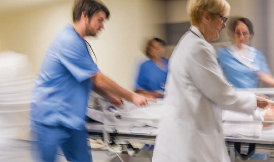physicians and nurses responding to an emergency