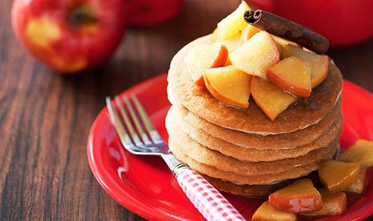 pumpkin pancakes with apple cinnamon topping