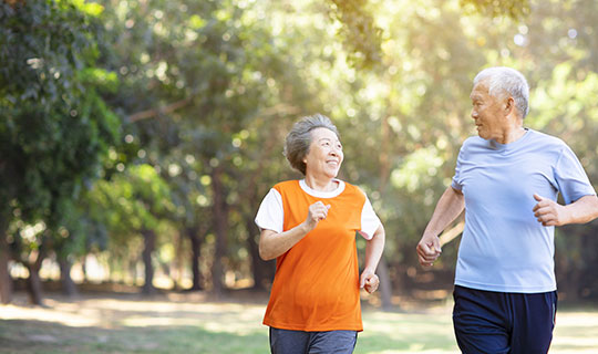 senior couple jogging together