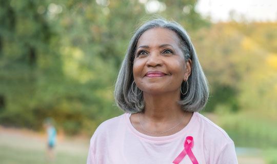 Woman with Breast Cancer Ribbon