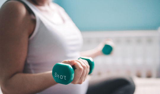 Pregnant woman working out