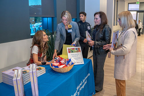 Joy Bauer, Nutrition and Health Expert on NBC’s Today Show signing her latest cookbook for guests at the opening of the State-of-the-art demonstration kitchen at the Jack & Sheryl Morris Cancer Center