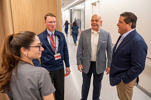 ack Morris, Chair of the Board of RWJUH, and Mark Manigan, President and CEO of RWJBarnabas Health express their graduate to Michael Kane, Executive Director of Pharmacy Services, Jack & Sheryl Morris Cancer Center