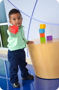 little boy with blocks