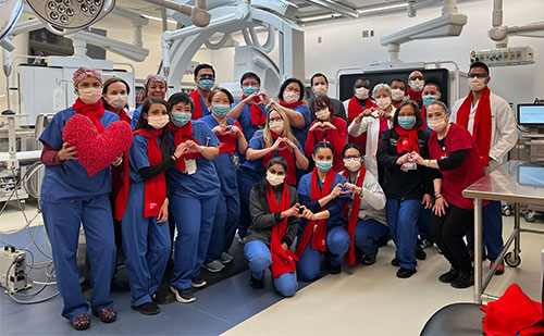 group of Jersey City Medical Center physicians, nurses, and employees on Go Red day