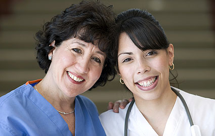 two nurses smiling