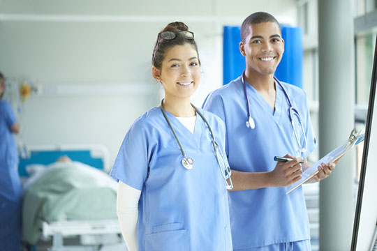 two nursing recent graduates