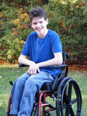 Micah in a wheelchair