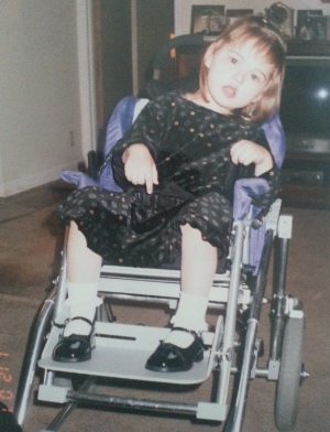 Lily in a wheelchair