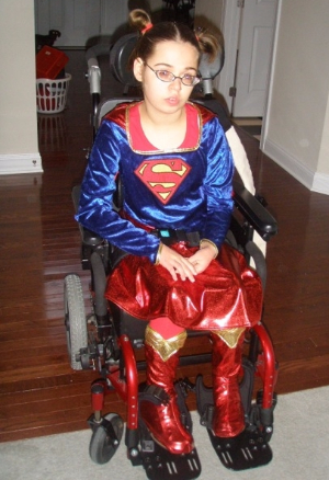Lily in a wheelchair