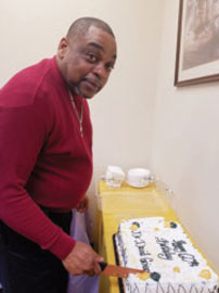 David cutting his 60th birthday cake