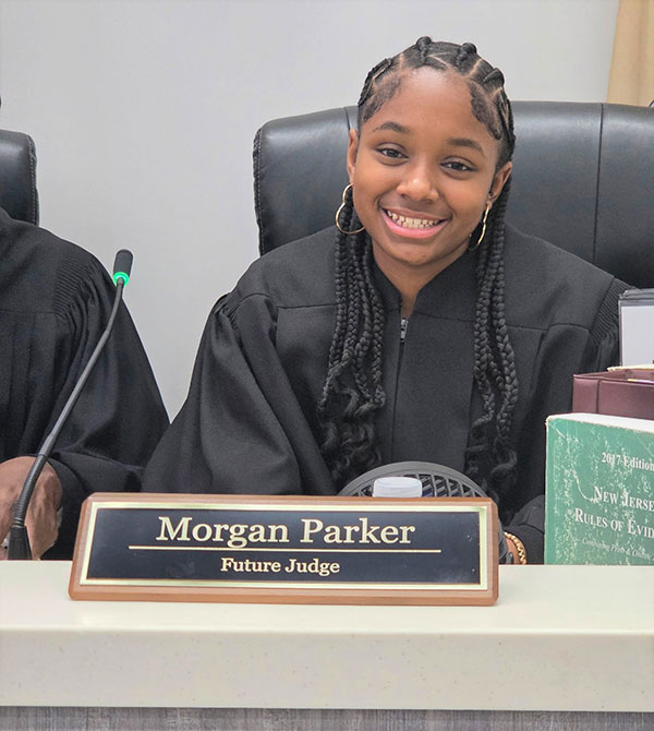 Morgan working as a judge